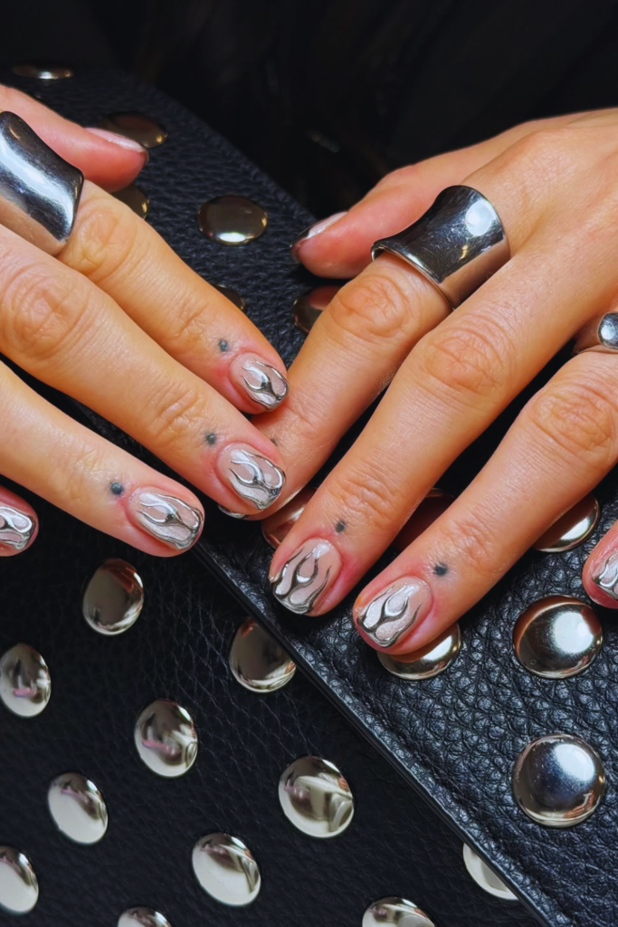 Silver chrome firework nails with reflective summer nail design