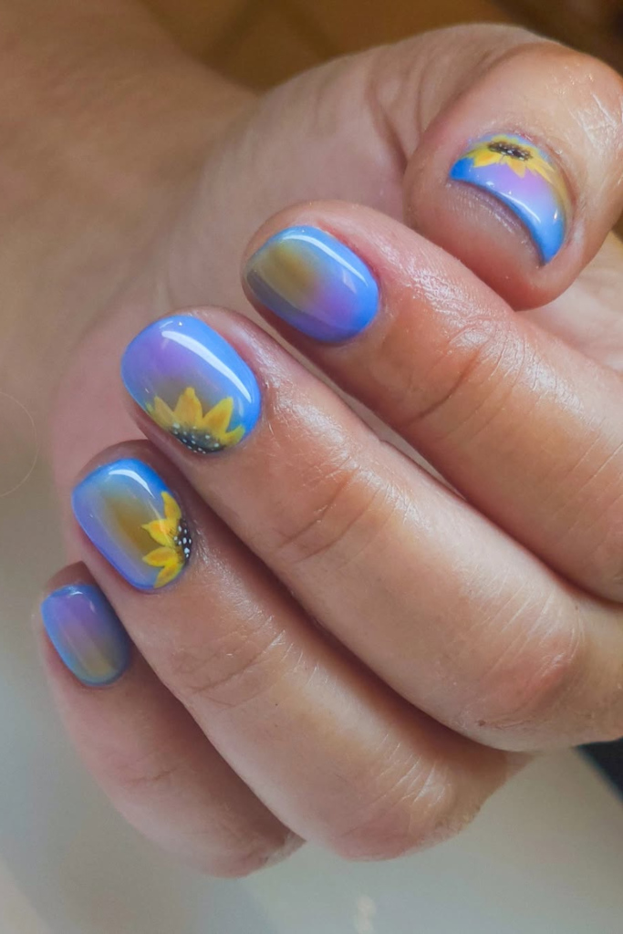 aura style nails with sunflower design soft blended colors