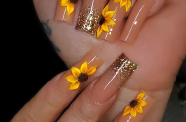 summer sunflower nail design with short, black, and French tip styles