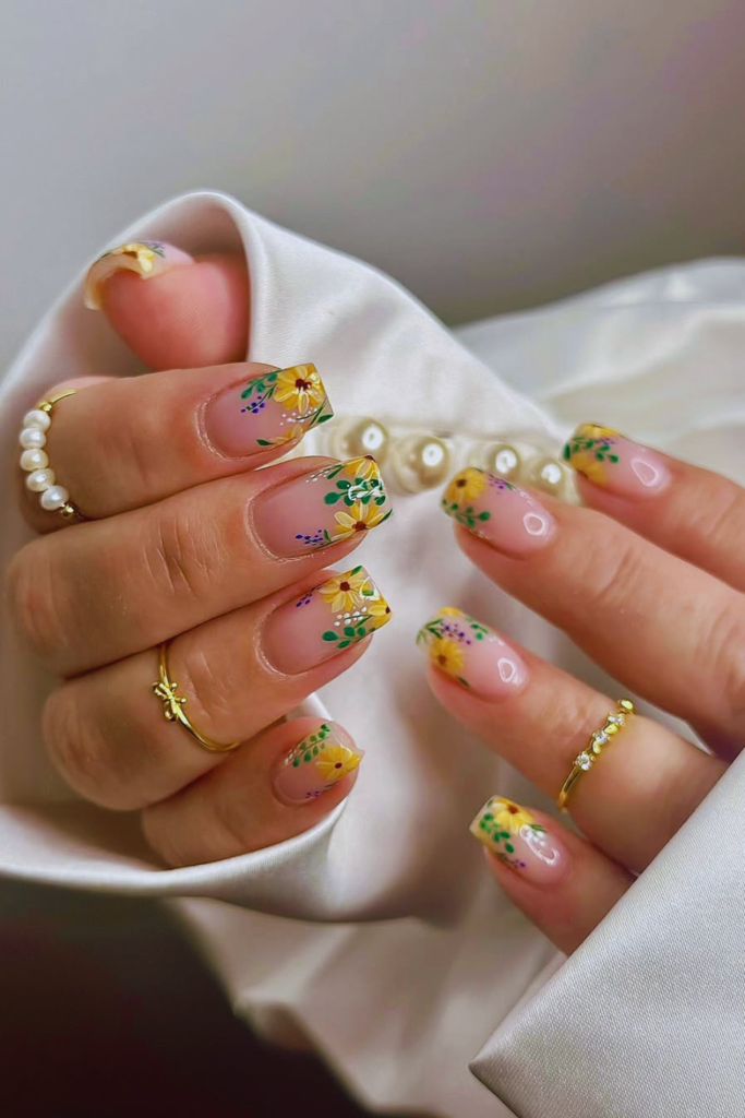 natural nails with simple sunflower art soft clean aesthetic