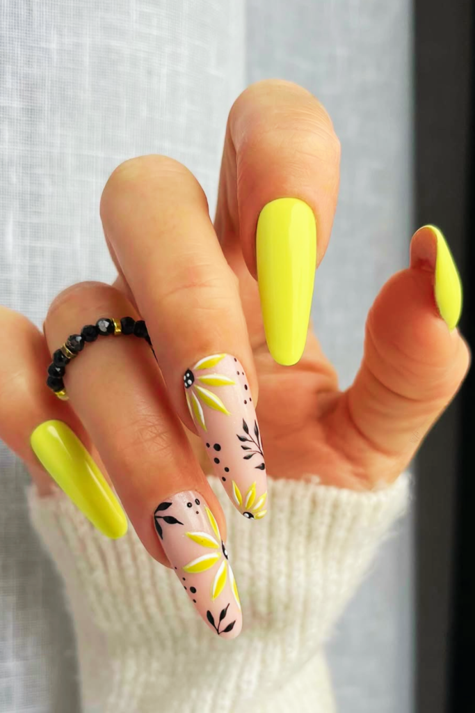 yellow chrome nails with floral sunflower art bold shiny finish