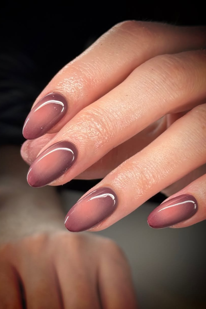 Aura nails with soft nude gradient design