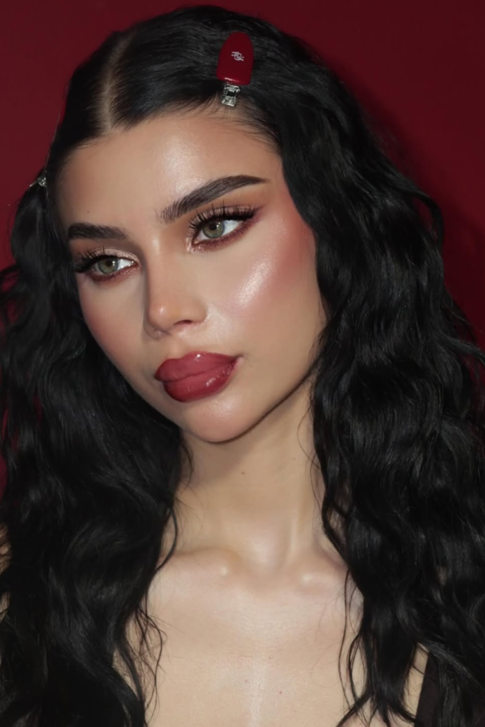Strawberry blush makeup with warm bronzed skin