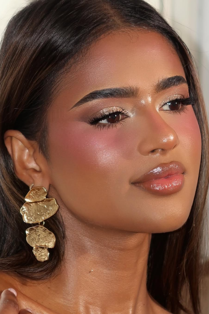 Golden hour makeup with radiant skin and soft shimmer