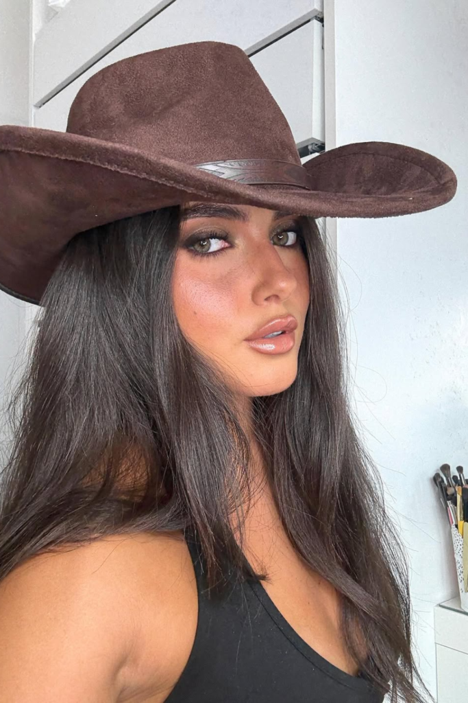 Coastal cowgirl makeup with bronzed skin and neutral eyes