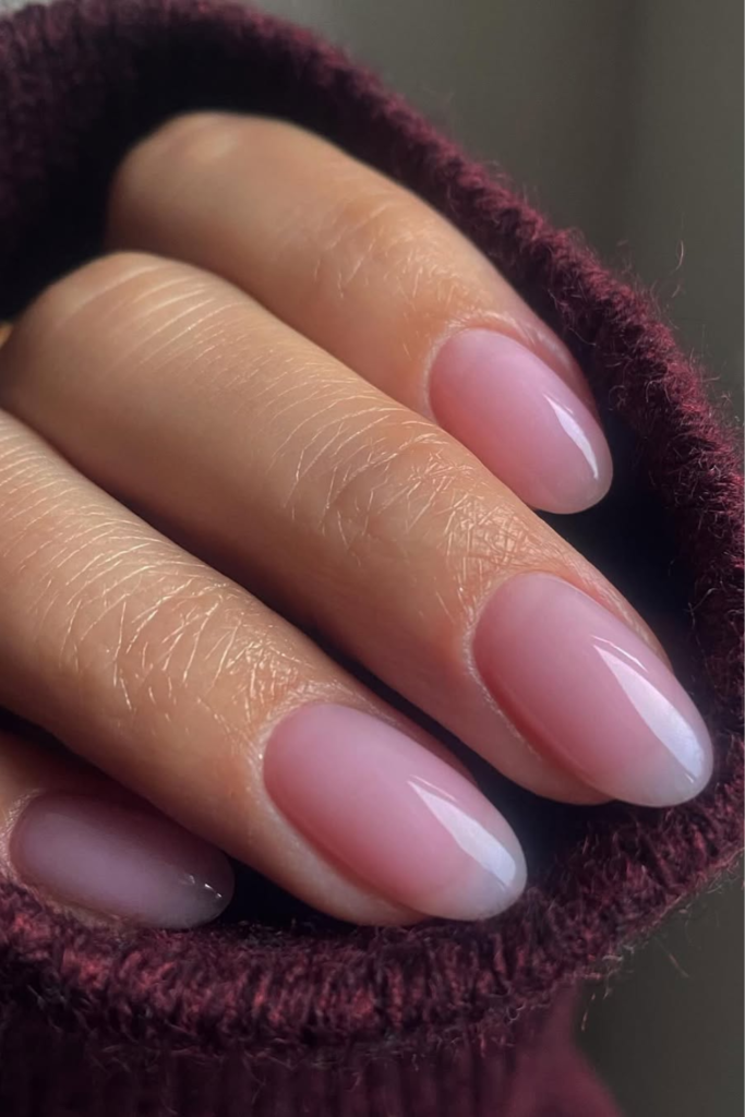 Sheer pink nails with natural glossy finish