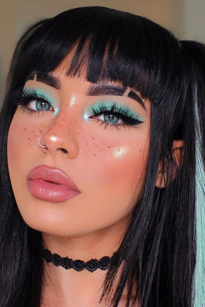 Tropical glow makeup with luminous skin and peach blush