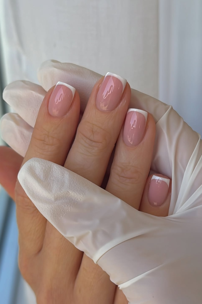 Clean French nails with modern minimalist tips
