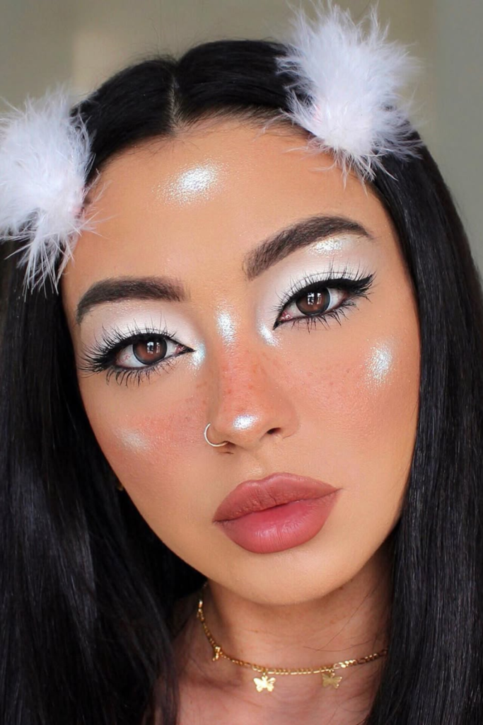 Soft summer glam makeup with champagne highlight and nude lips