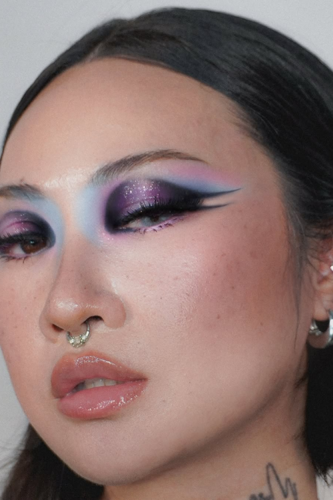 Futuristic cyber eyeliner with metallic details and modern editorial styling