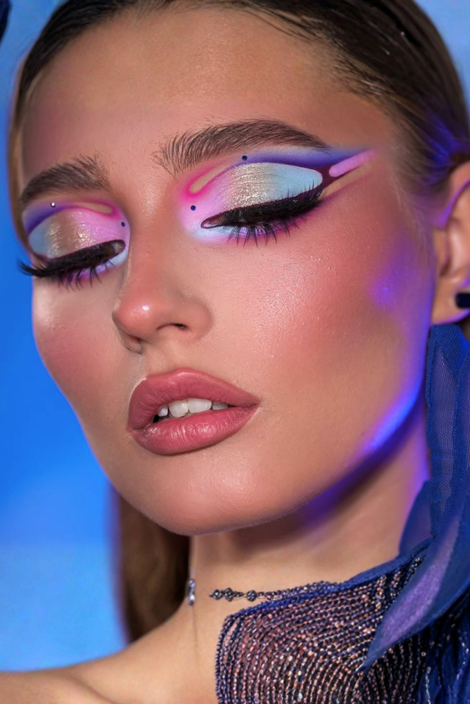 Sharp cut-crease liner creating a structured and dramatic eye makeup look