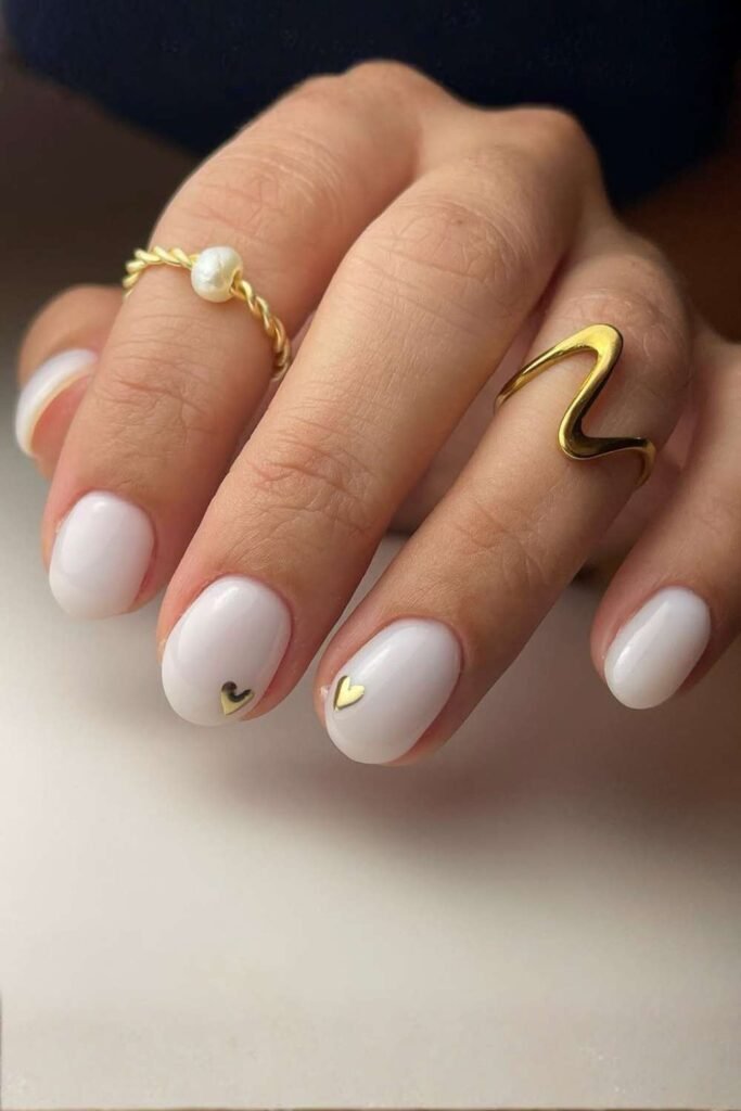 Milky white short nails with clean manicure