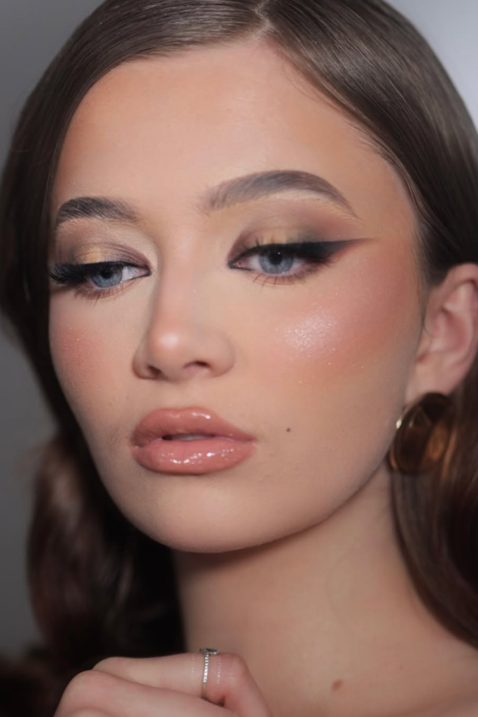Reverse eyeliner design highlighting the lower lash line with creative detailing
