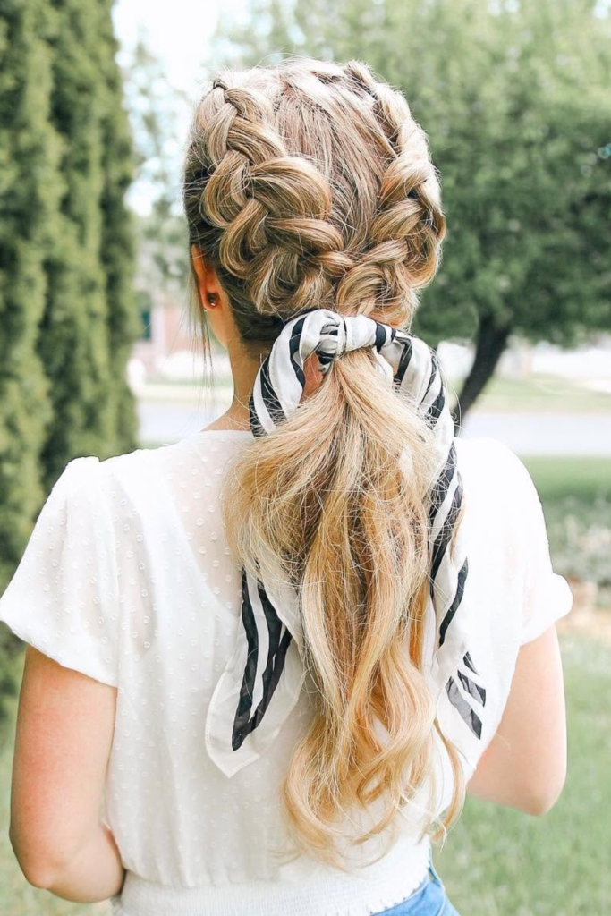 Dutch braids with woven ribbon details