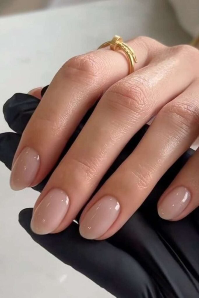 Rounded nude nails with natural polished look