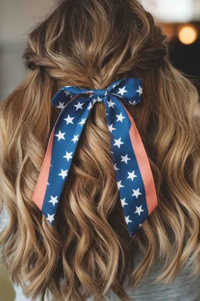 Half-up hairstyle with a satin bow detail