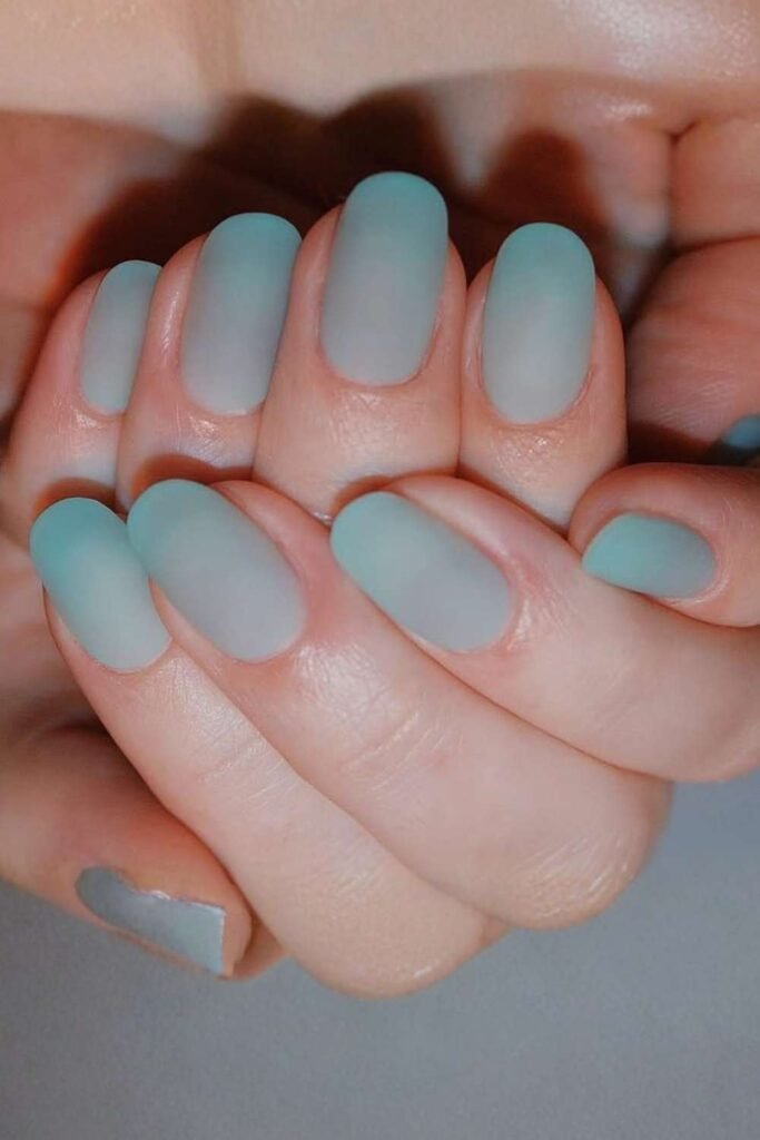 Sea glass nails with coastal green manicure