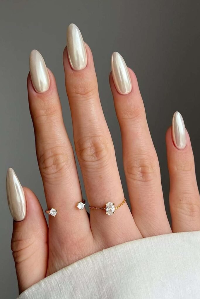Vanilla chrome nails with luxury neutral shine