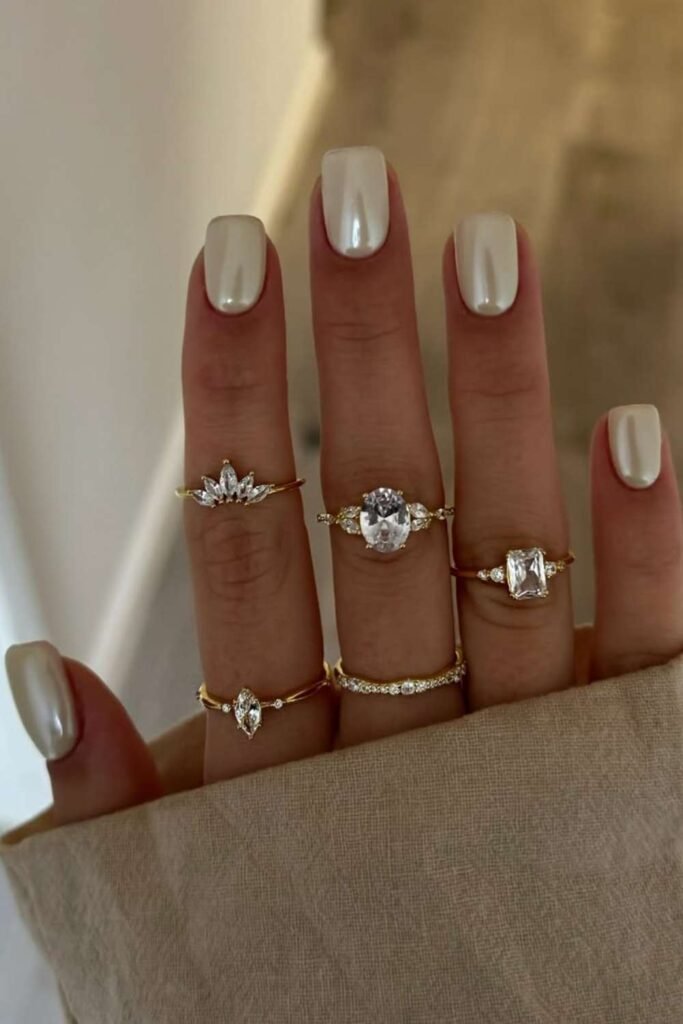 Vanilla chrome short nails with subtle shine