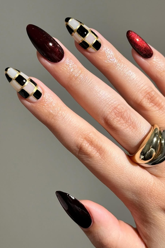 Harlequin-inspired manicure with metallic diamond nail pattern
