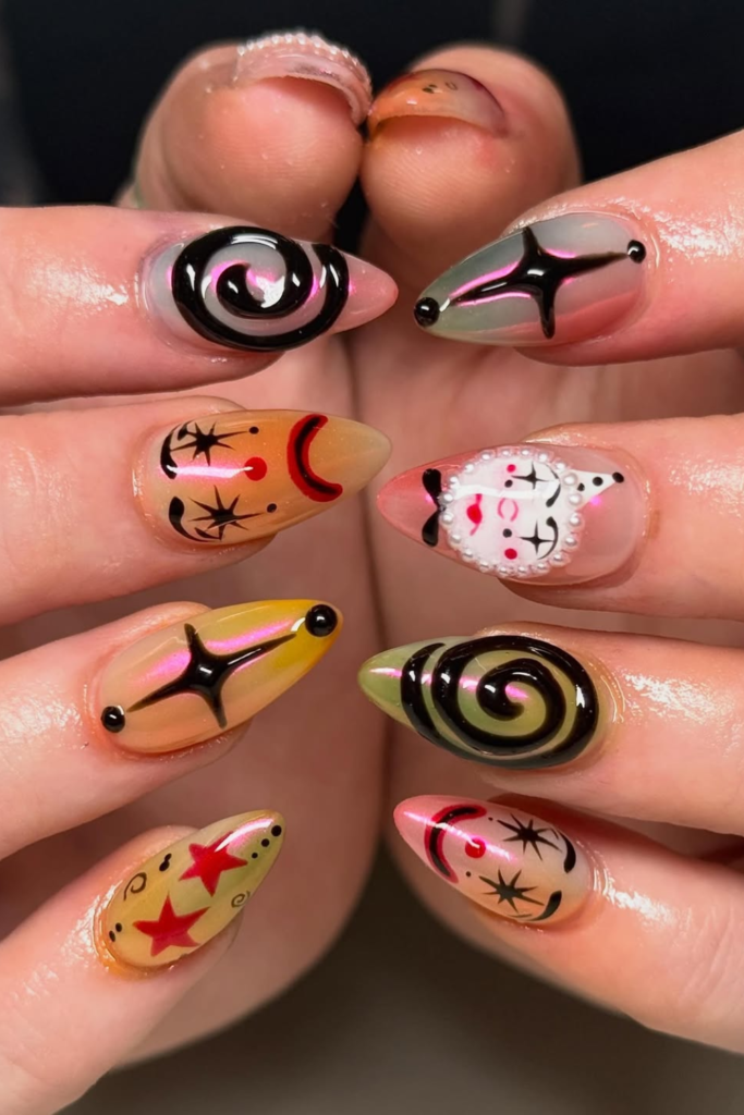 Maximalist mismatch manicure with unique artistic nail designs