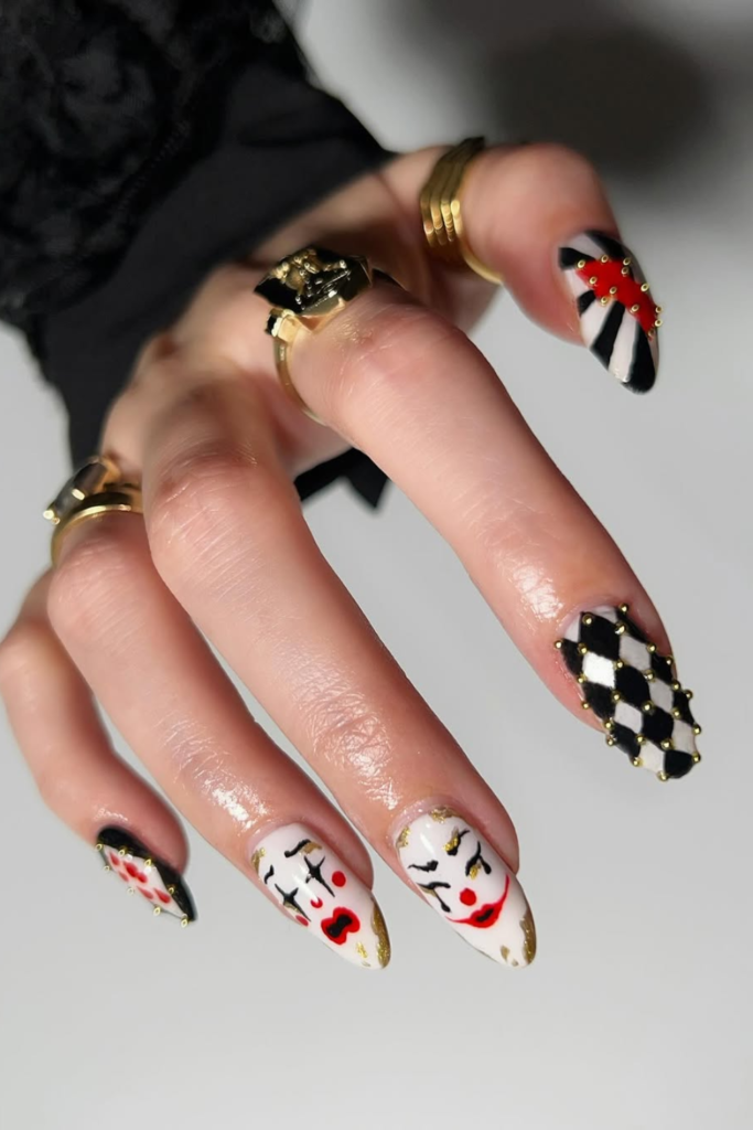 Colorful clowncore nail design with playful artistic details