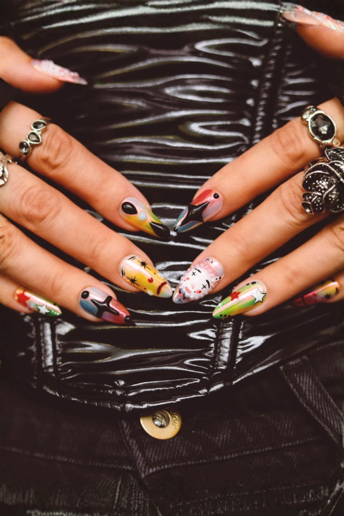 Circus-inspired manicure with elegant vintage carnival accents