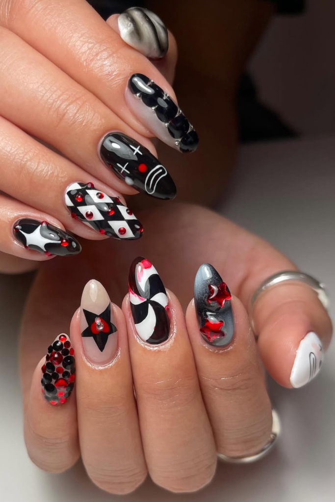 Airbrushed nail art featuring soft gradients and colorful details