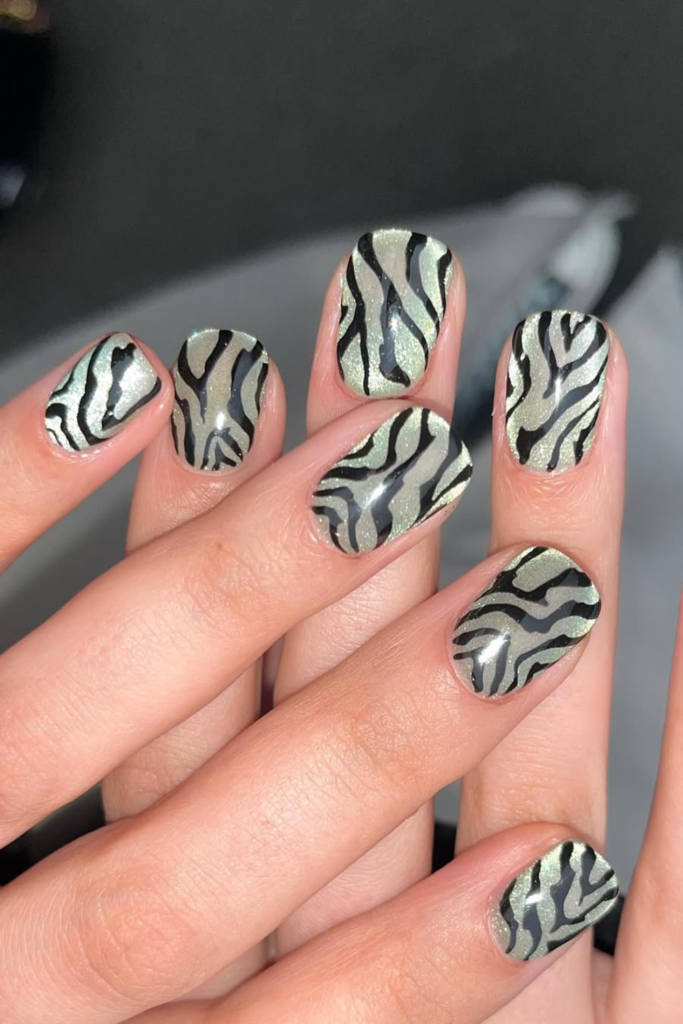 Velvet magnetic manicure with elegant zebra stripe details