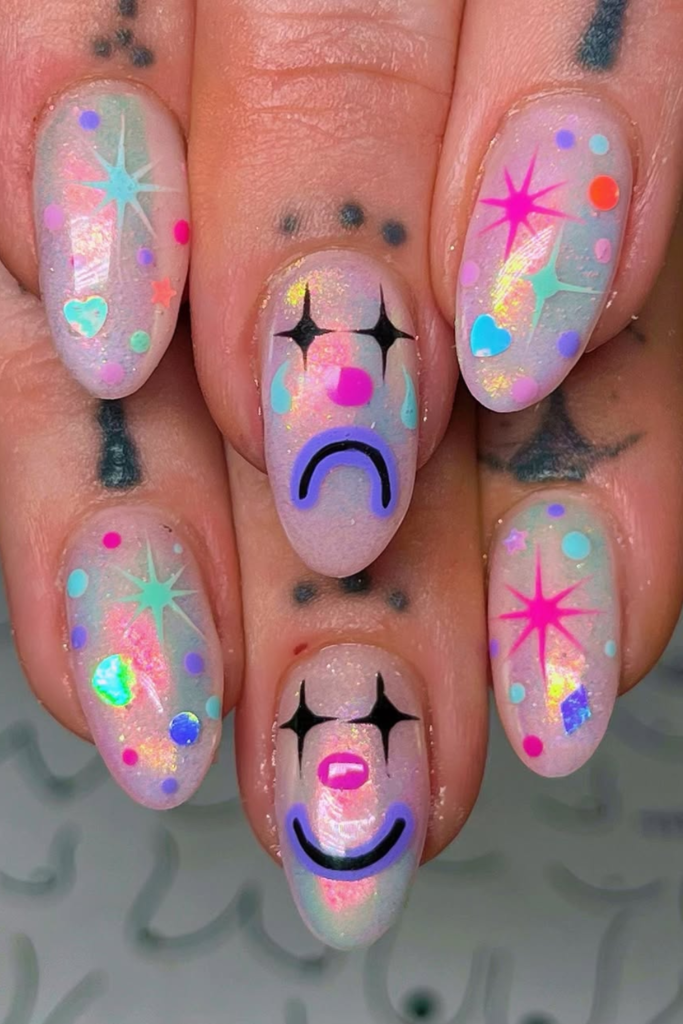 Glass-effect manicure with reflective artistic nail accents